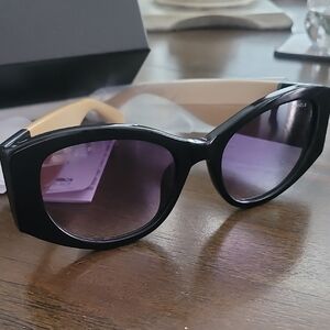 Chanel Black Cat-Eye Sunglasses with Purple Gradient Lenses